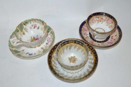 A group of three mid 19th Century English porcelain tea bowls and saucers, one early 19th Century
