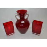 A pair of ruby coloured Art Glass vases of rectangular form together with a further large ruby