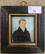 British School, 19th century, Regency portrait of a young man, watercolour on card,6.5x7.5cm, framed