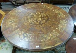 Victorian revival circular dining or centre table, the top profusely inlaid with floral detail,