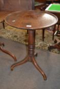 Small Georgian wine table with circular dished top, turned column and tripod base, top 50cm