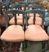A set of six late Victorian dining chairs with pink upholstered seats and carved decoration