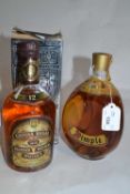 A bottle of Dimple De Luxe Scotch Whisky, together with a bottle of Chivas Regal Scotch Whisky,
