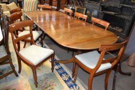 A set of eight Victorian mahogany bar back dining chairs with turned front legs