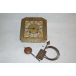 Late 19th or early 20th Century brass grandmother clock movement
