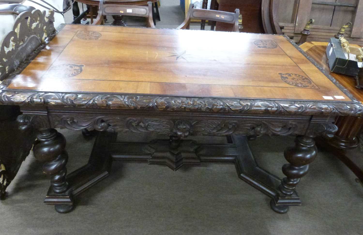 A 19th Century central European writing table or desk with two freize drawers, inlaid top with