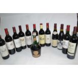 Twelve bottles of assorted French red wines and one bottle of Benedictine, (13)