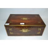 19th Century rosewood and brass inlaid writing box of hinged form with red leather lined interior,