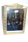 An early 20th Century brass framed rectangular dressing table mirror with bevelled glass, 38cm high