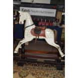Modern rocking horse bearing plate marked Special Millennium Limited Edition to mark the year 2000 -