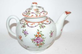 A Lowestoft teapot and cover with polychrome design with floral sprays (pot with crack)
