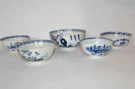 A group of five English 18th Century porcelain bowls, all with blue and white designs including a