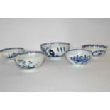 A group of five English 18th Century porcelain bowls, all with blue and white designs including a