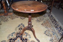 A Georgian oak wine table with circular top, turned column and tripod base, top 57cm high, overall