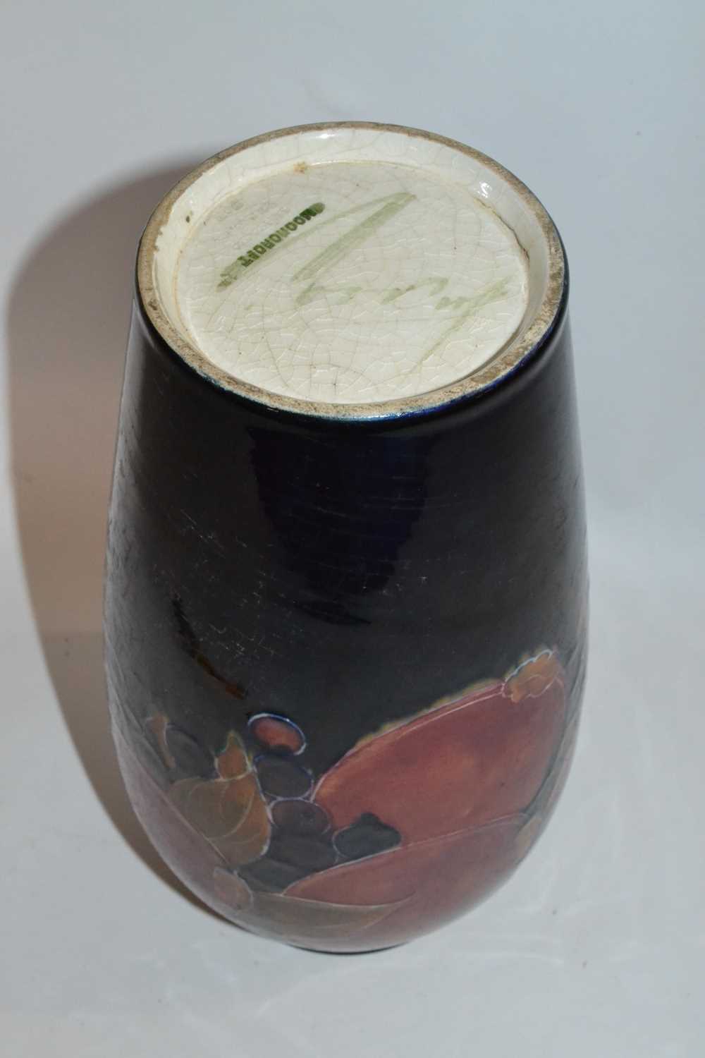 Moorcroft vase, the blue ground tubelined with the Pomegranate pattern, 27cm high Burslem mark, - Image 2 of 2