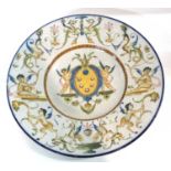 An Italian Maiolica dish, the base marked Gecchi Firenze, decorated in 18th Century style, 34cm