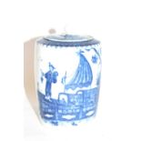 An 18th Century Caughley tea caddy and cover decorated with the fisherman print in blue, 12cm high