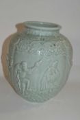 A Chinese vase of globular form, the celadon ground decorated with immortals, the base stamped