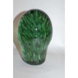 A large Victorian dump paperweight, green glazed of typical shape and form