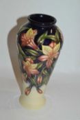 Moorcroft vase with the Peruvian Lily design, 21cm high