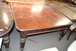 Victorian mahogany extending dining table on turned legs with brass caster, no extra leaves, 132cm