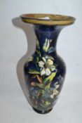 A Doulton Lambeth faience vase late 19th Century, the blue ground with floral decoration by Alice