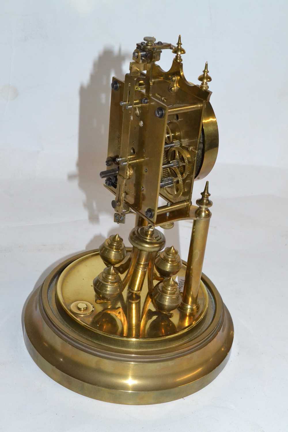 Gustav Becker - a brass 400 day torsion mantel clock of typical form with white enamel dial set - Image 2 of 2