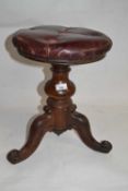 Victorian revolving piano stool with buttoned leather top, 43cm high