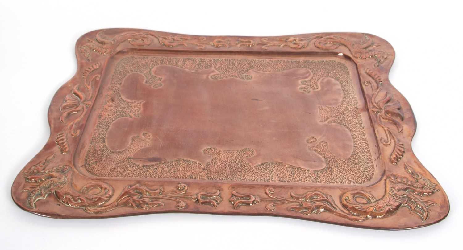 A large Arts & Crafts copper serving tray, decorated with a border of dragons and foliate detail, 56 - Image 2 of 6