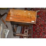 An 18th Century oak joint stool of typical form with rectangular top with moulded edge, turned