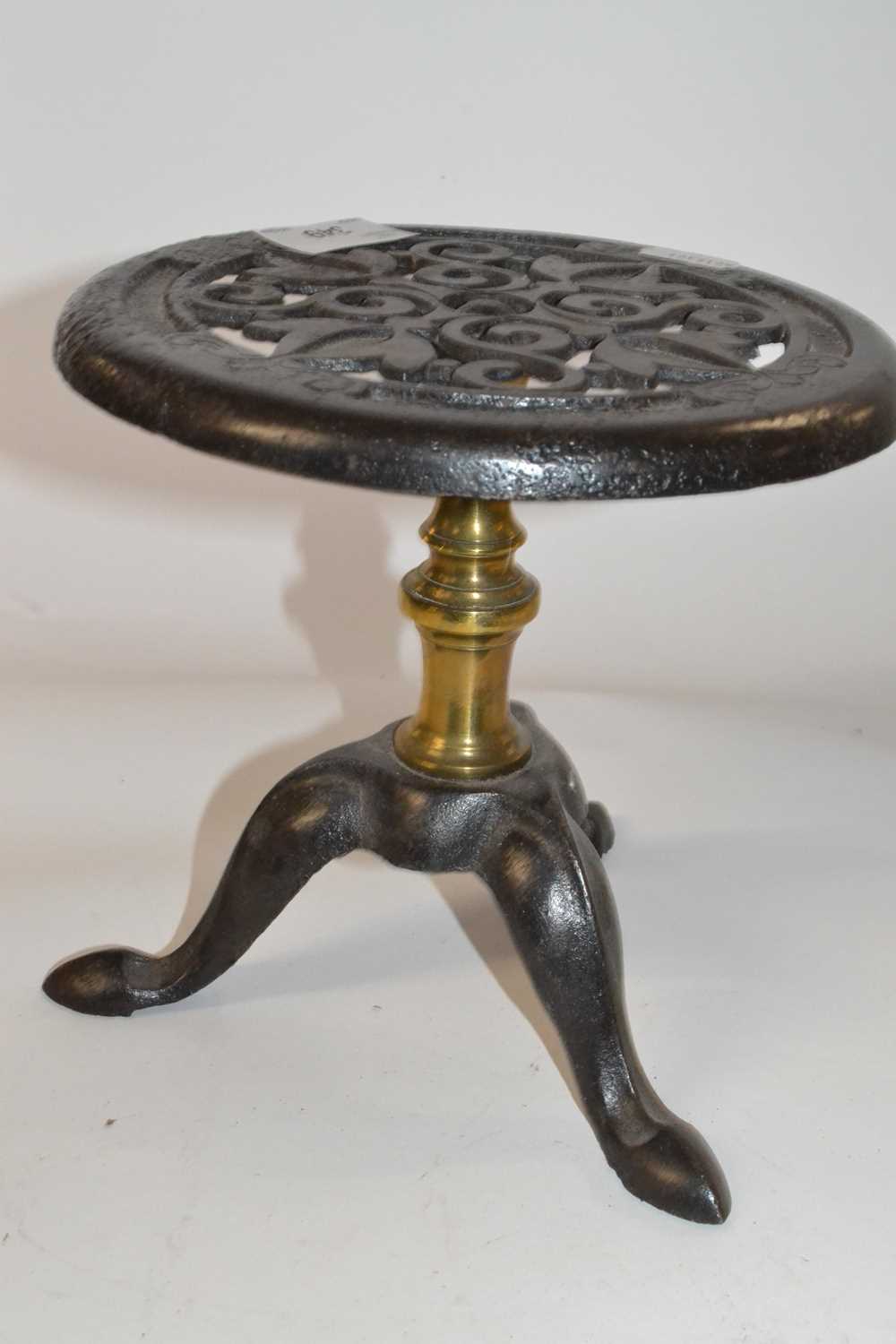Mixed Lot: A Victorian cast iron spitoon together with a further circular tripod base trivet and a - Image 3 of 3
