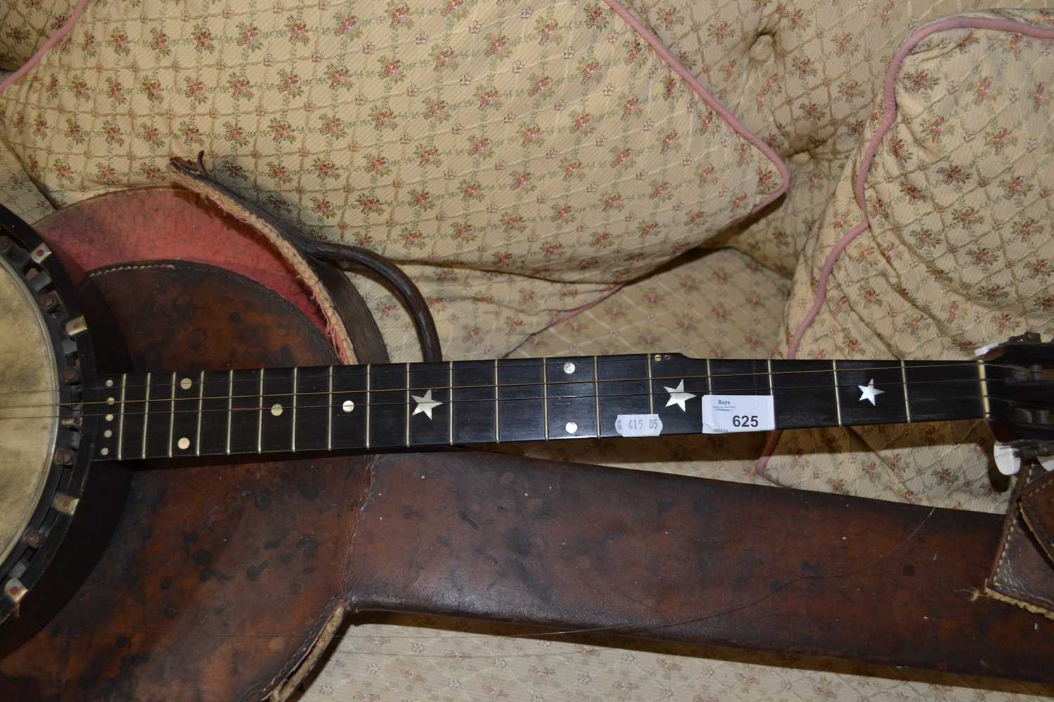 An antique banjo with six strings, stamped to the reverse of the head, J E Dallas Maker, 92cm long - Image 4 of 5