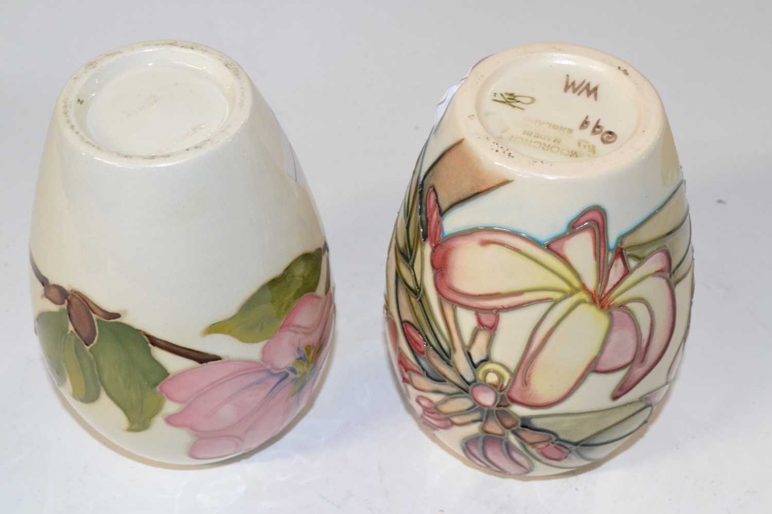 Two Moorcroft vases, one in the Magnolia pattern and further vase with tubelined floral design n a - Image 2 of 2
