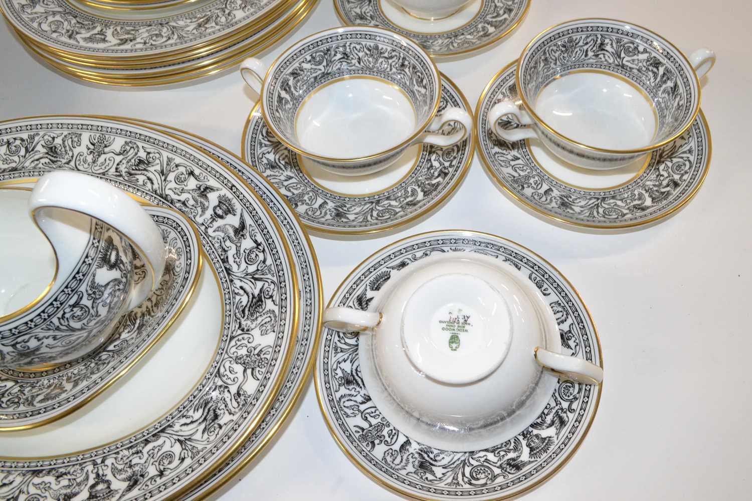 A Wedgwood Florentine pattern dinner service comprising two large oval serving dishes, gravy boat - Image 2 of 4