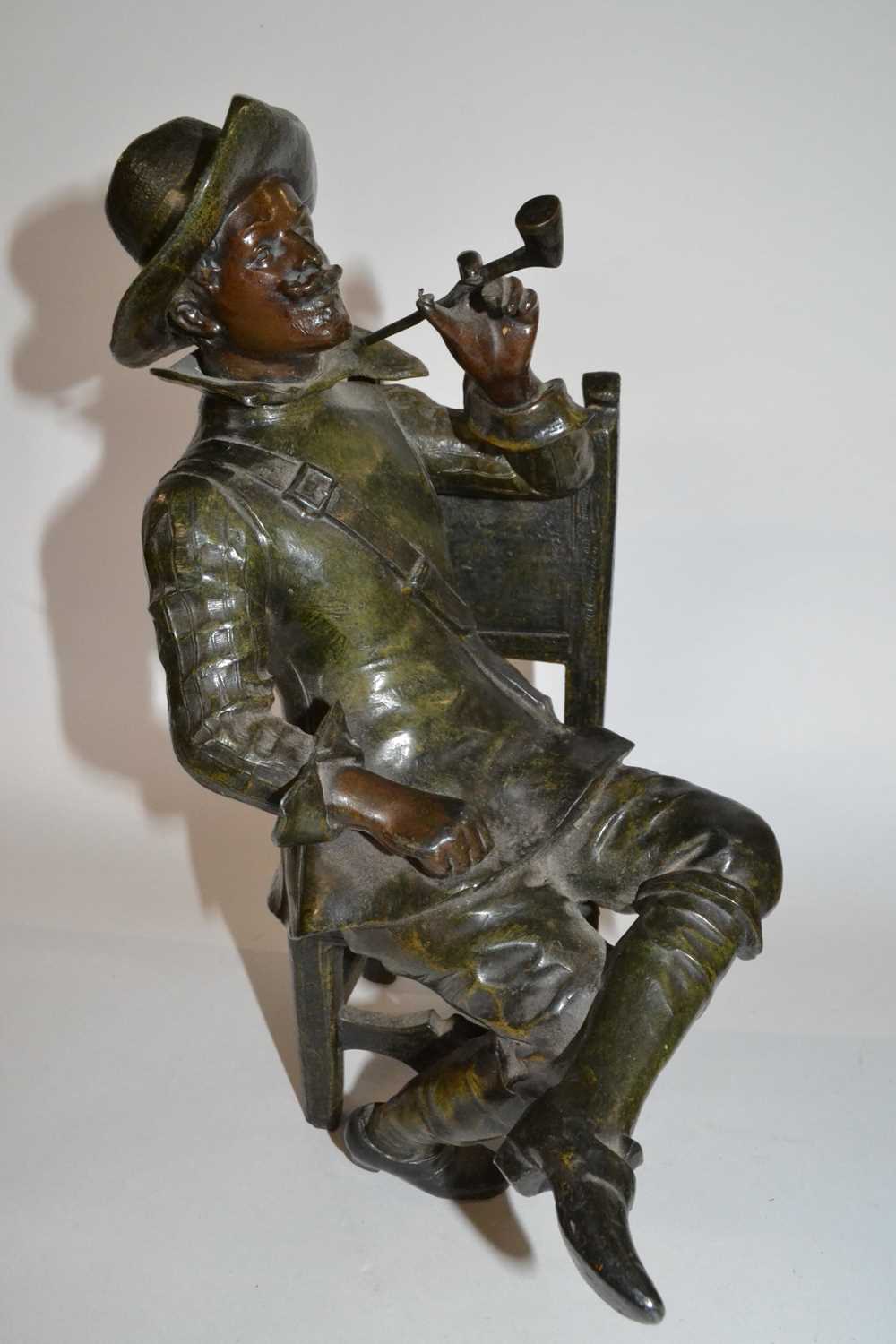 Two bronzed Spelter figures, one of a Cavalier seated and a further gentleman seated smoking a pipe, - Image 3 of 3