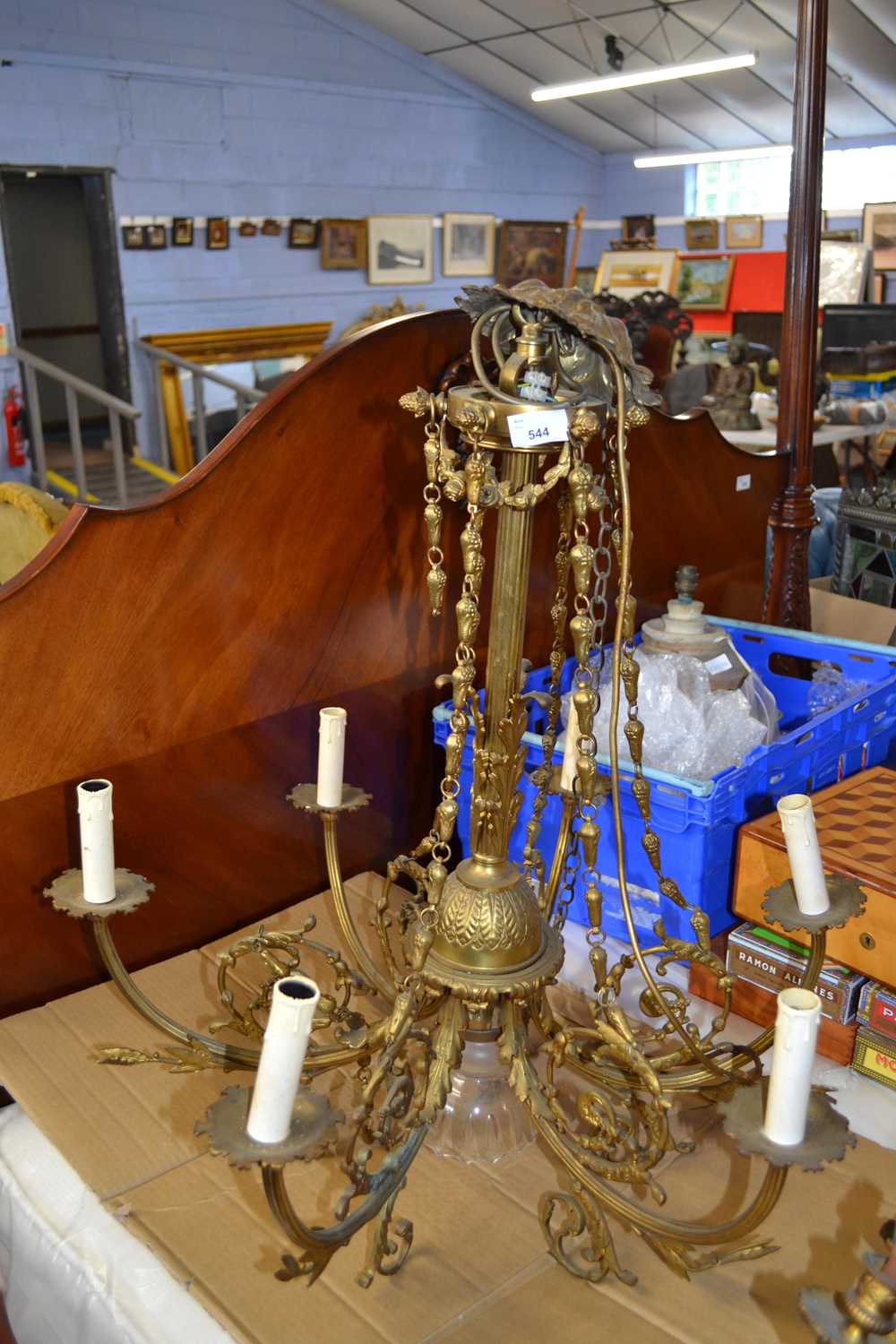 20th Century gilt brass six branch ceiling light fitting with scrolled foliate decoration, 70cm