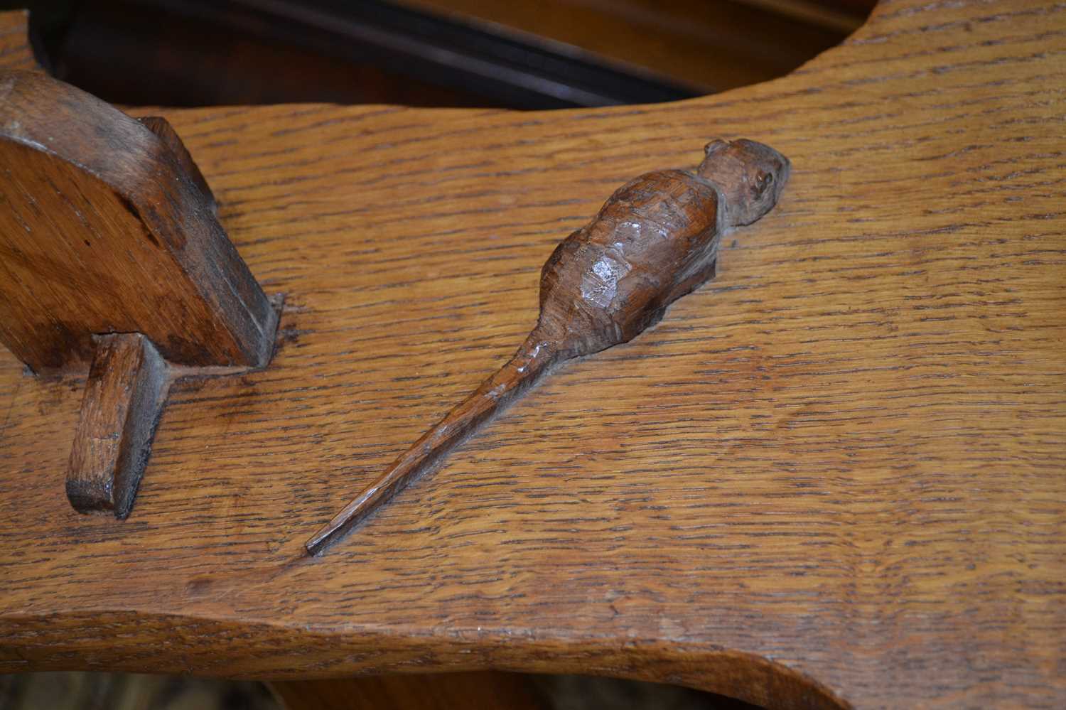 An oak Arts & Crafts style low bench of plain form, the end carved with a mouse, 127cm long - Image 2 of 2