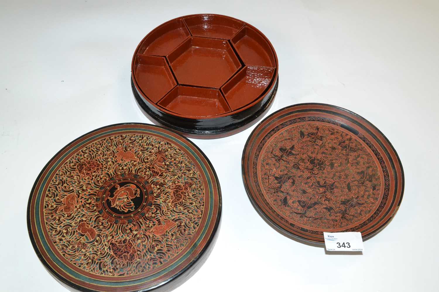 A lacquer box and cover, the interior with a series of small trays and dividers with a scrolling - Image 2 of 3