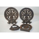 Mixed group of small iron plaques comprising a pair of pierced form with easel backs, further