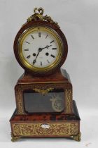 HRY Marc Paris, a simulated boule and ebonised mantel clock of drum head form fitted with a brass