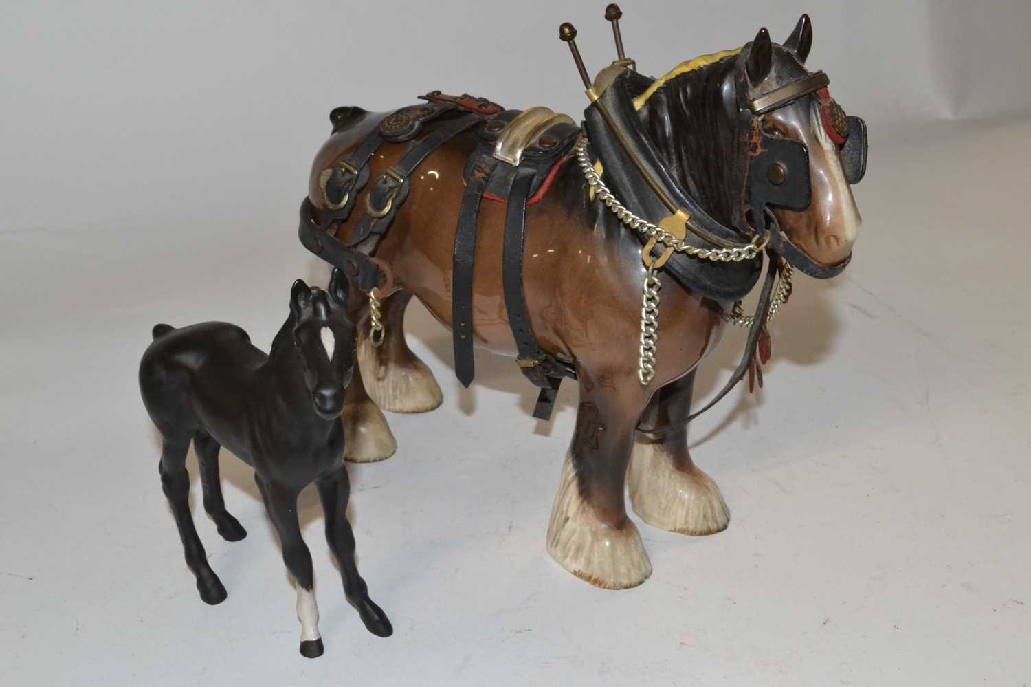 A Beswick model of a horse with saddle together with a Beswick Black Beauty foal in matt finish - Image 2 of 2