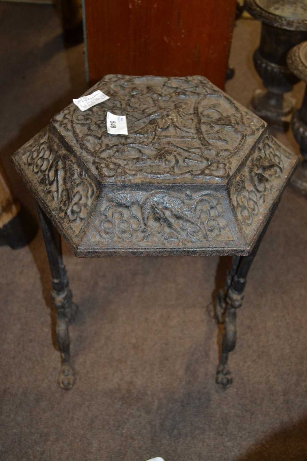 An unusual Victorian aesthetic style iron cover or stool, the top decorated in chinoiserie type