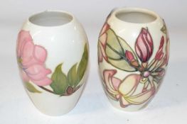 Two Moorcroft vases, one in the Magnolia pattern and further vase with tubelined floral design n a