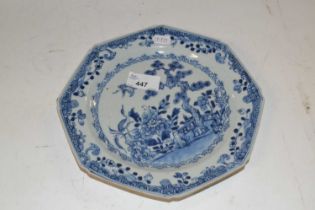 An 18th Century Chinese porcelain octagonal plate with brown line rim, blue and white chinoiserie