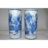 A pair of Chinese porcelain cylindrical vases with blue and white design of Chinese characters, late