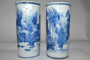 A pair of Chinese porcelain cylindrical vases with blue and white design of Chinese characters, late