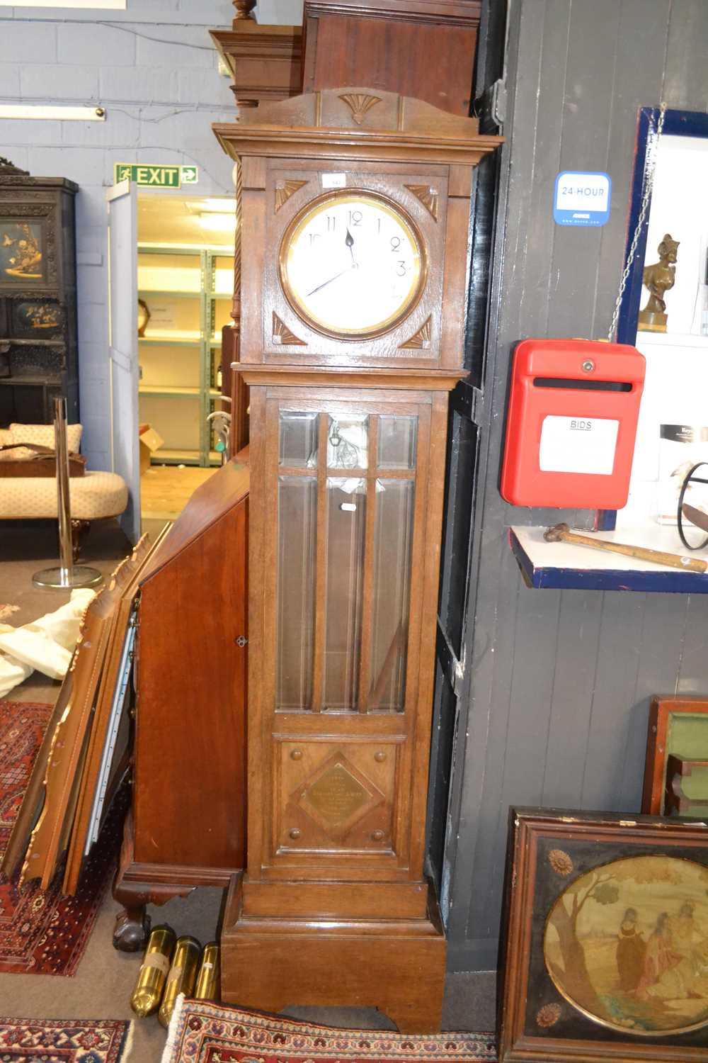 An early 20th Century oak cased grandmother clock with brass movement striking on steel rods, - Image 2 of 2