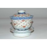 A Chinese porcelain rice bowl cover and stand, 19th Century with four character mark to base and
