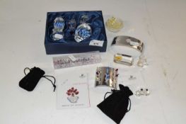 A quantity of Swarovski crystal memories including a boxed set of owls, all with yellow/green eyes