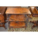 A Victorian walnut veneered three tier shelf or what not with base drawer, 68cm wide Overall very